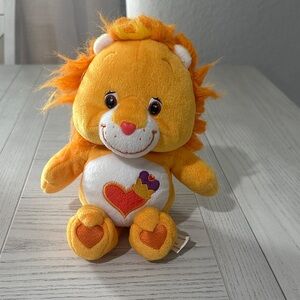 Care Bears Orange Plush Lion with Heart Details
